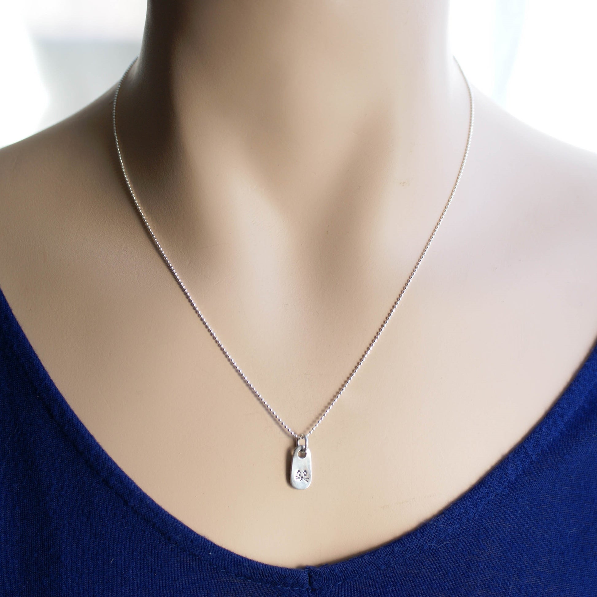 Petite Silver Necklace in Artisan Pewter with handstamped kitty face on neck
