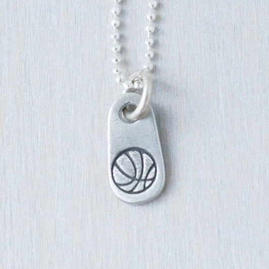 Silver basketball necklace in artisan pewter