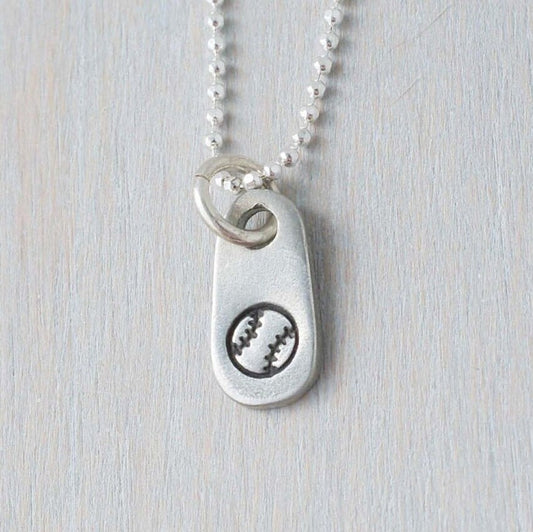 Silver softball necklace in artisan pewter