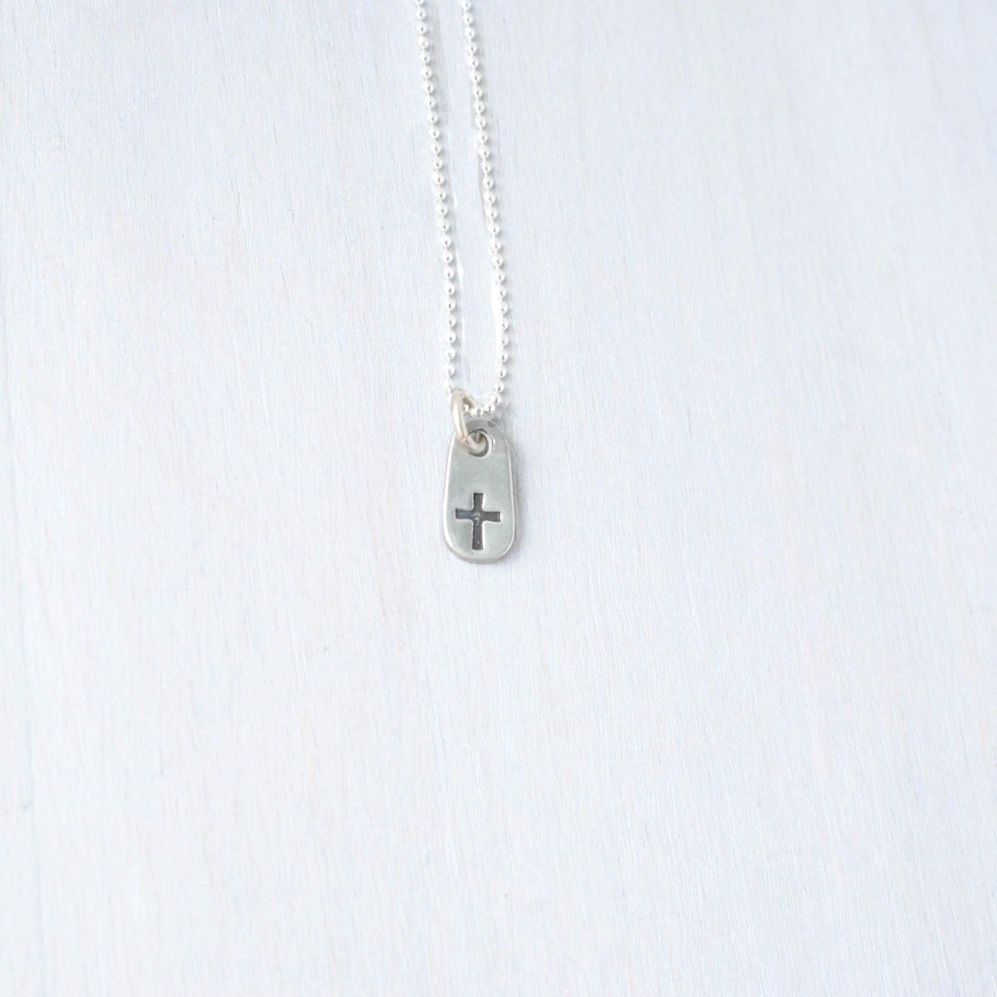 image of small cross necklace