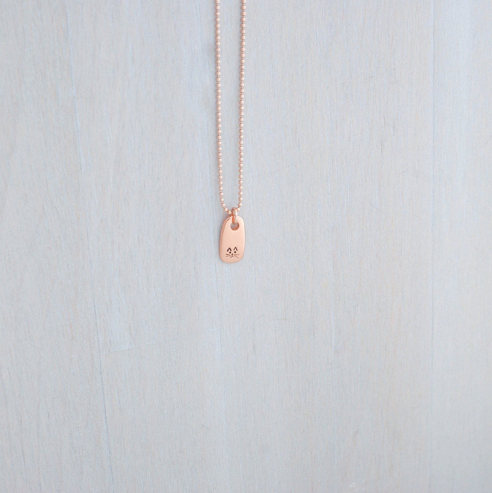 Petite Rose Gold Necklace handstamped with a kitty face