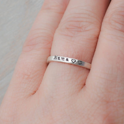 Sterling silver ring handstamped with Mama and two hearts on hand
