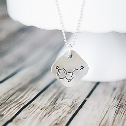 Sterling silver diamond shape necklace stamped with serotonin molecule