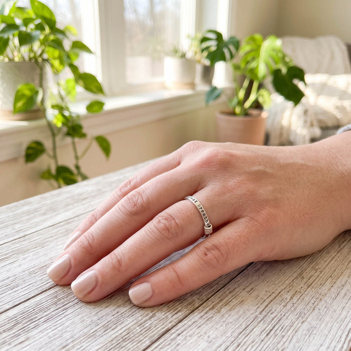 woman wearing just breathe ring on hand