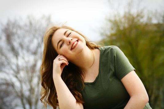 image of woman thinking for Why is Self-Love Jewelry Meaningful blog post