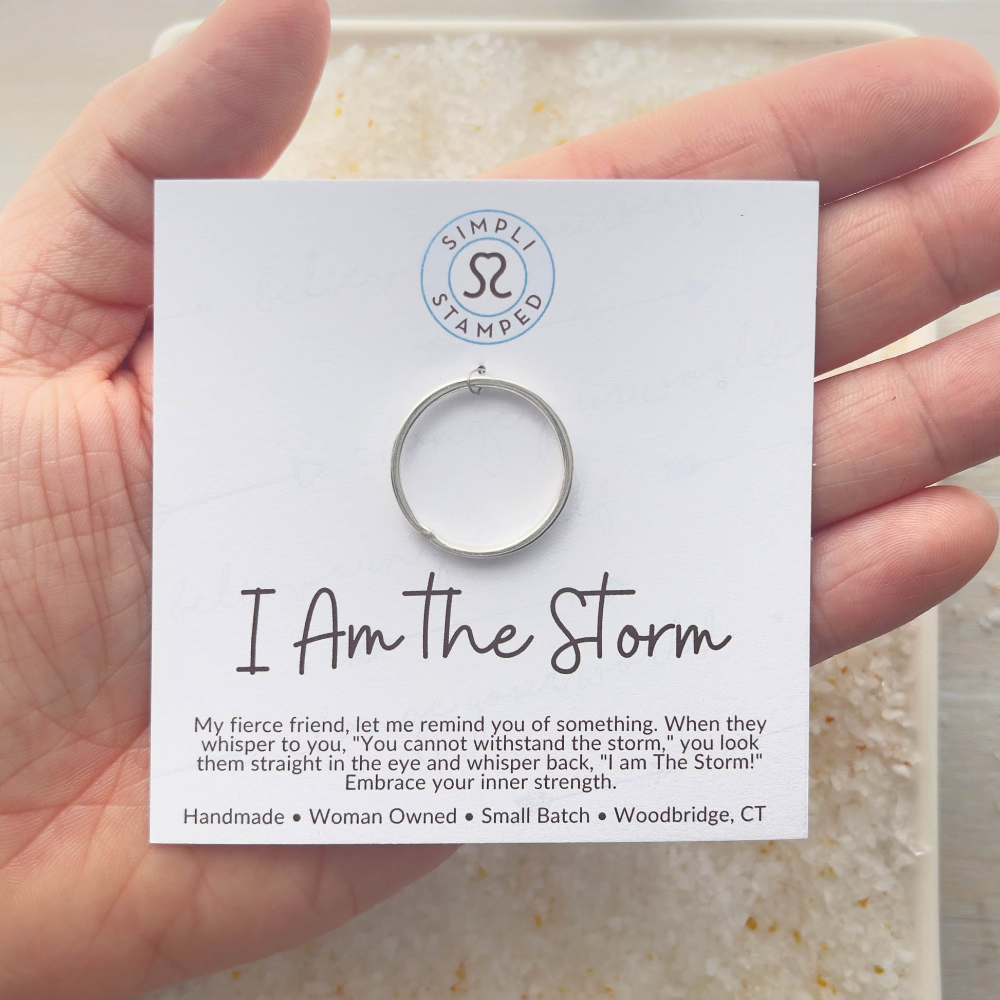 Image of I am the storm ring on motivational card