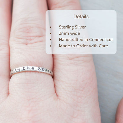 Image of I Am the Storm ring on a hand with the product details overlayed. Sterling silver, 2mm wide, handcrafted in connecticut, made to order with care.