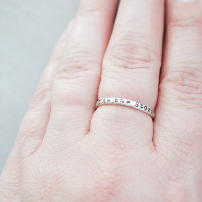 Image of I am the storm quote ring on hand