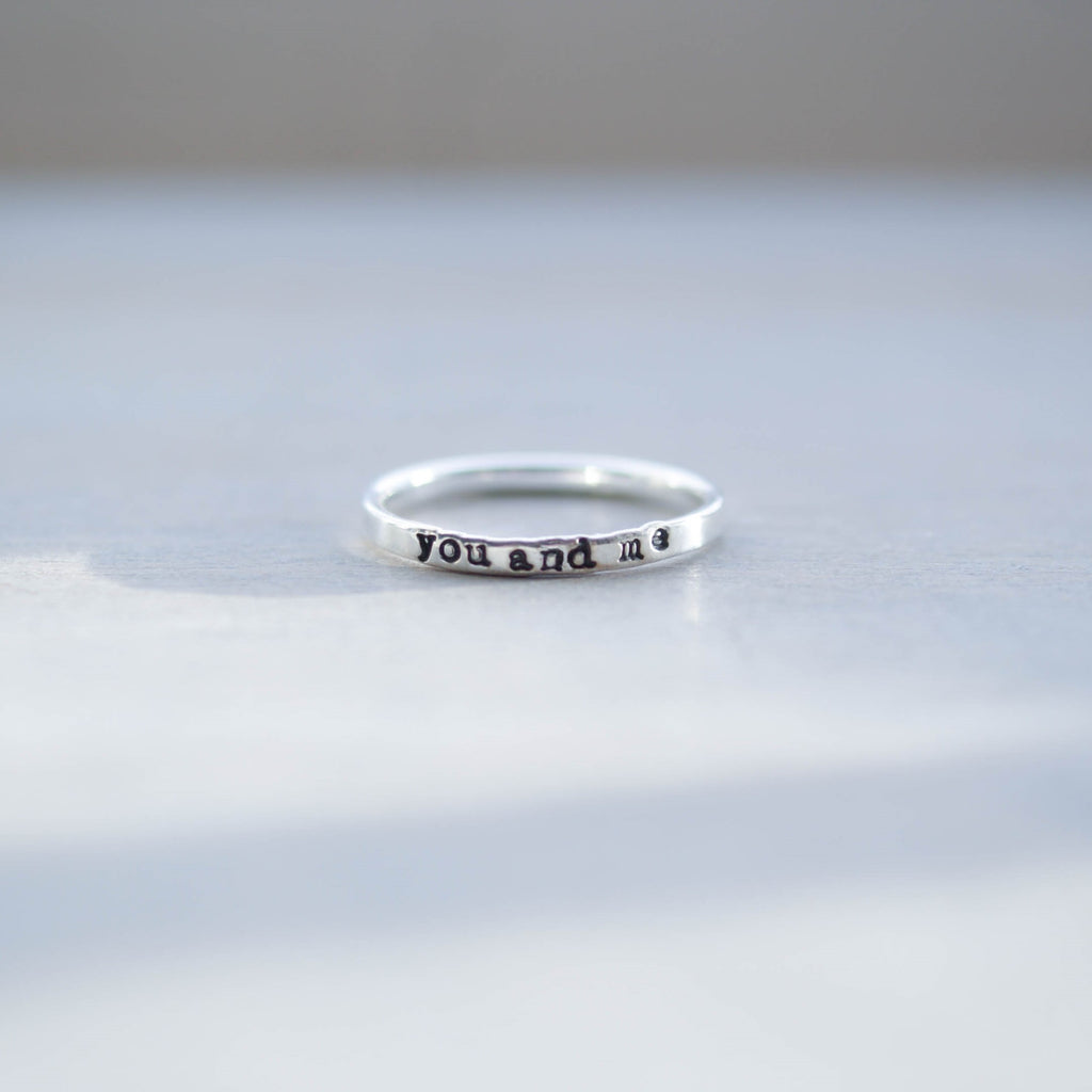 Skinny sterling silver ring stamped with you and me