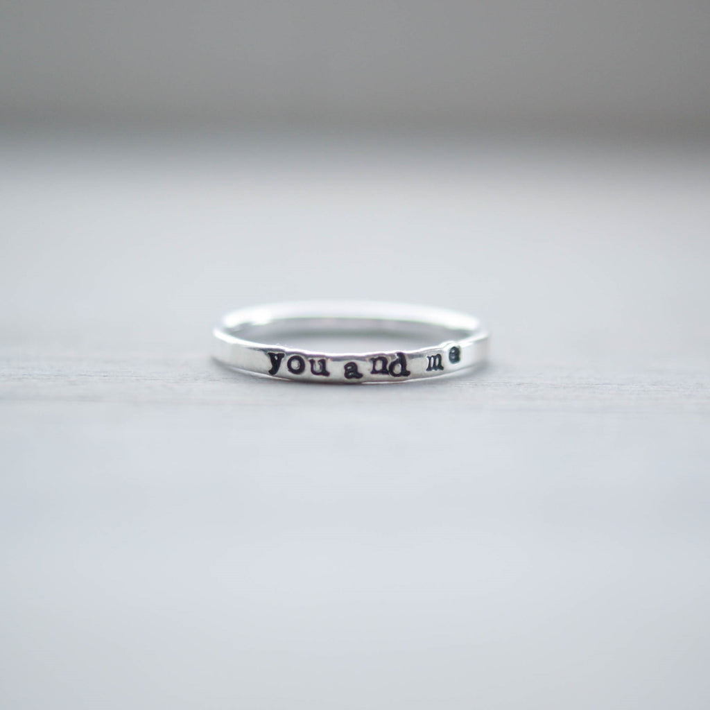 Skinny sterling silver ring stamped with you and me