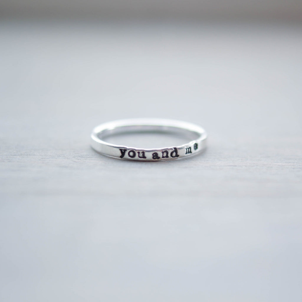 Skinny sterling silver ring stamped with you and me
