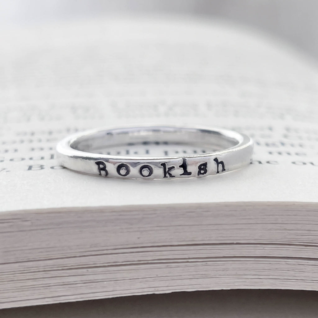 sterling silver ring inscribed with Bookish on a book