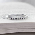 sterling silver ring inscribed with Bookish on a book