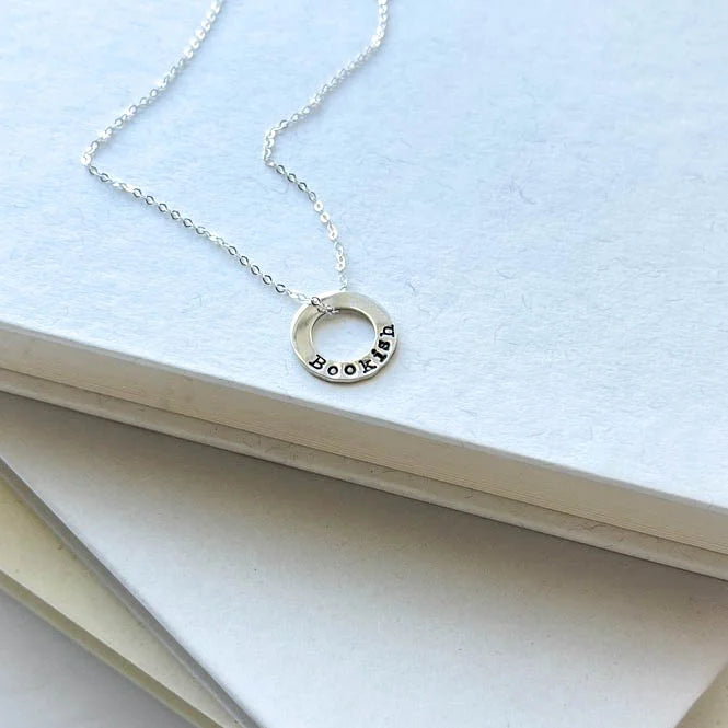 sterling silver neckalce stamped with Bookish on white background
