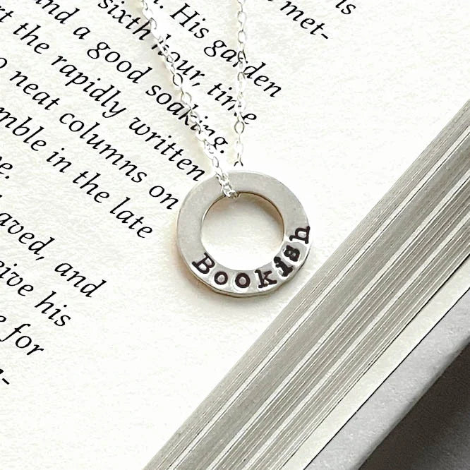 sterling silver neckalce stamped with Bookish on white background