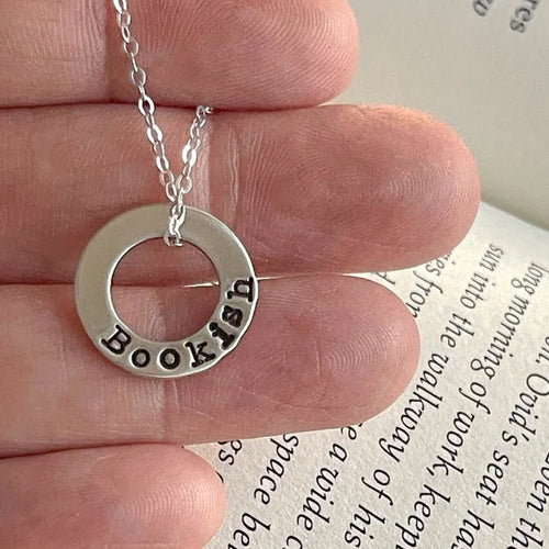 sterling silver neckalce stamped with Bookish on white background