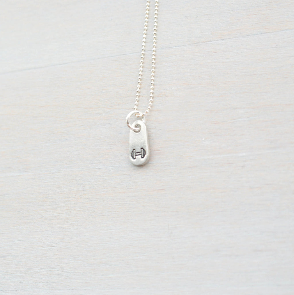 Silver dumbbell necklace for gym lover in artisan pewter