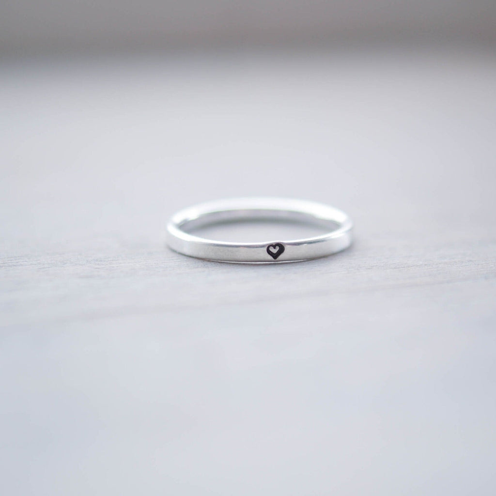 Sterling silver ring stamped with small heart