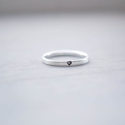 Sterling silver ring stamped with small heart