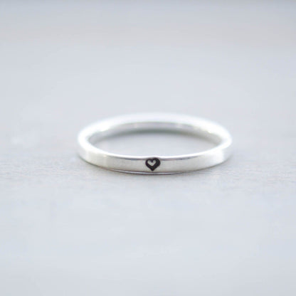 Sterling silver ring stamped with small heart