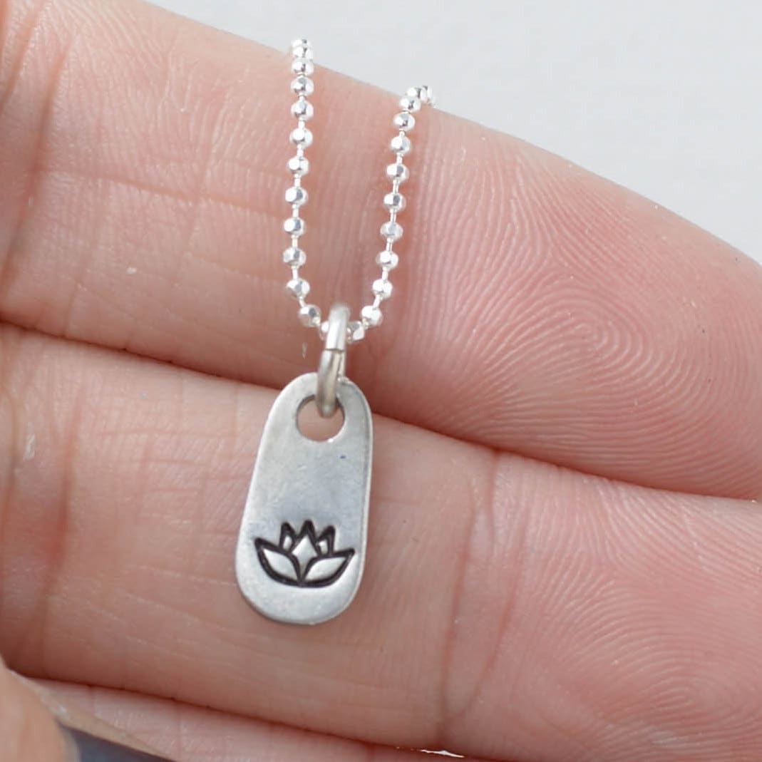 Silver lotus necklace in artisan pewter