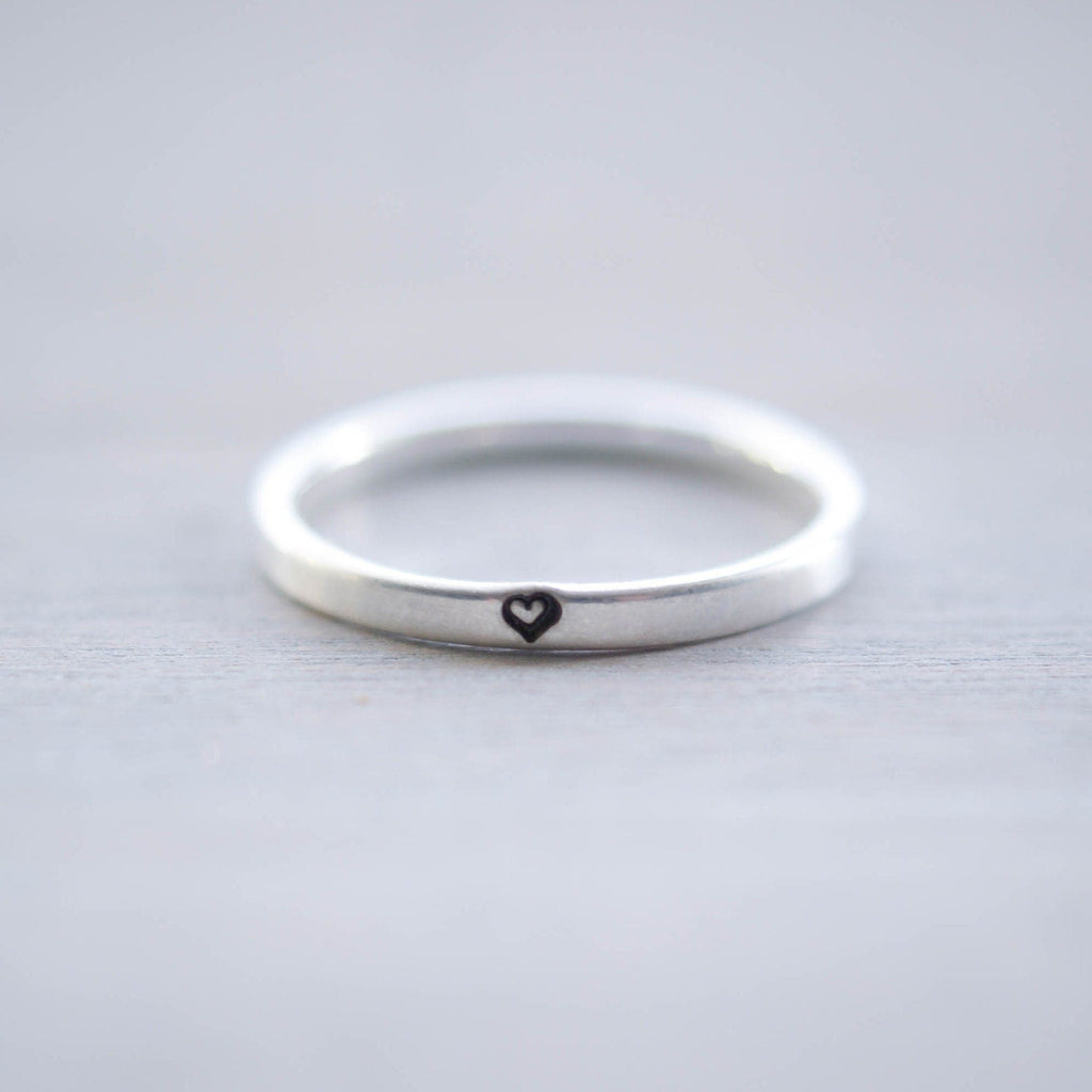 Sterling silver ring stamped with small heart