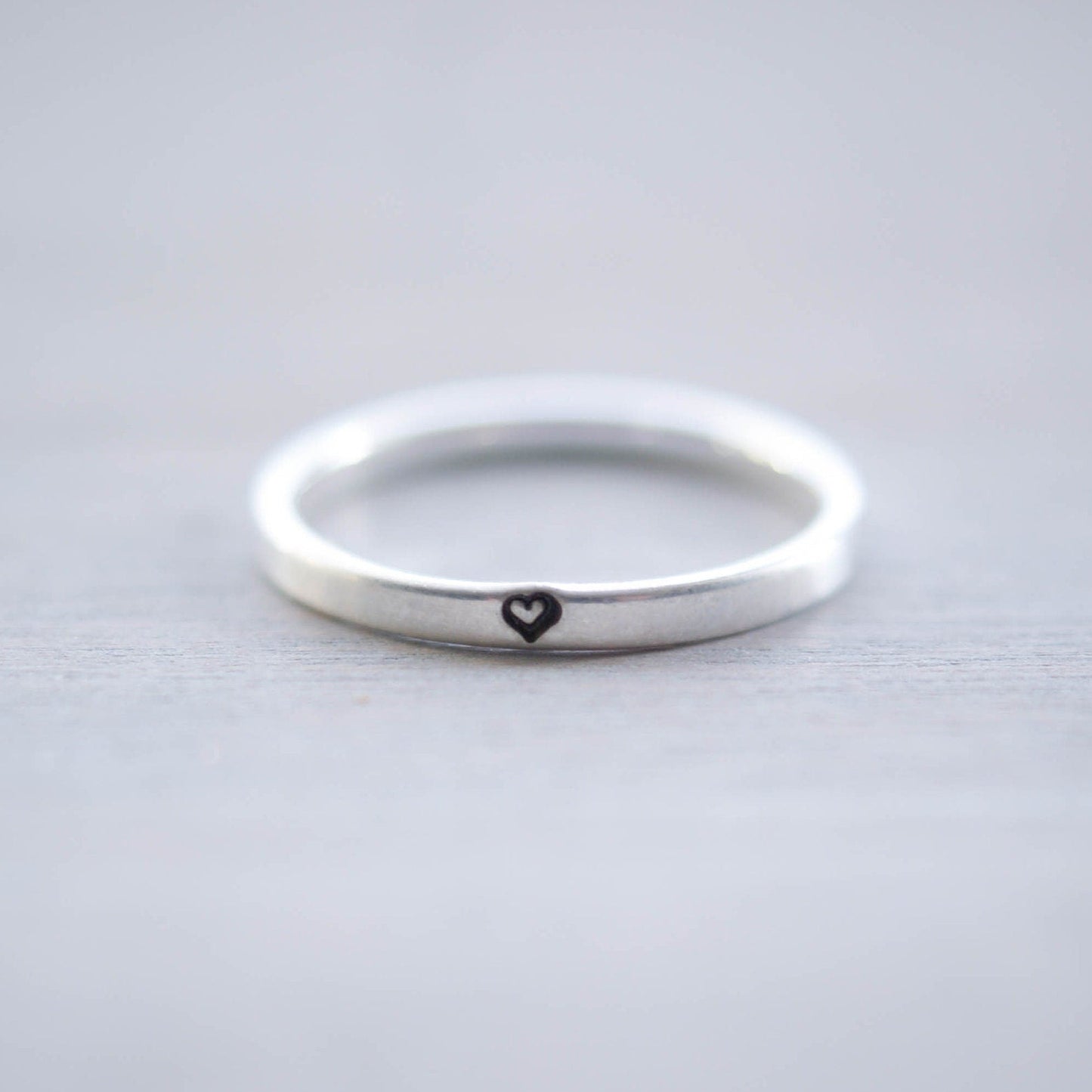 Sterling silver ring stamped with small heart