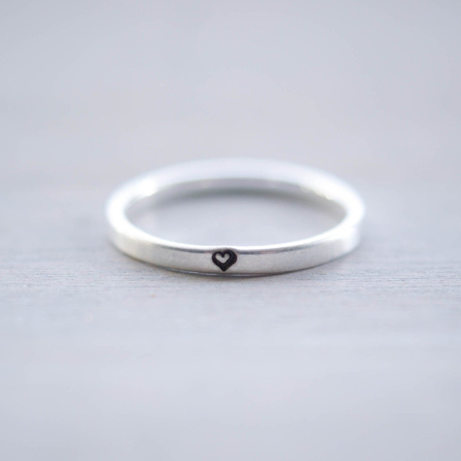 Sterling silver ring stamped with small heart