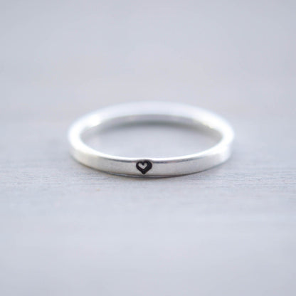 Sterling silver ring stamped with small heart