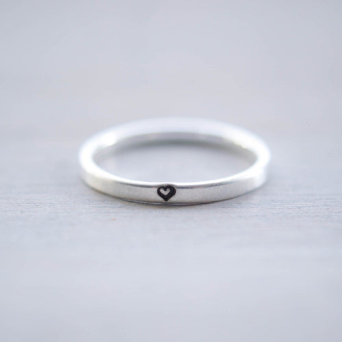 Sterling silver ring stamped with small heart