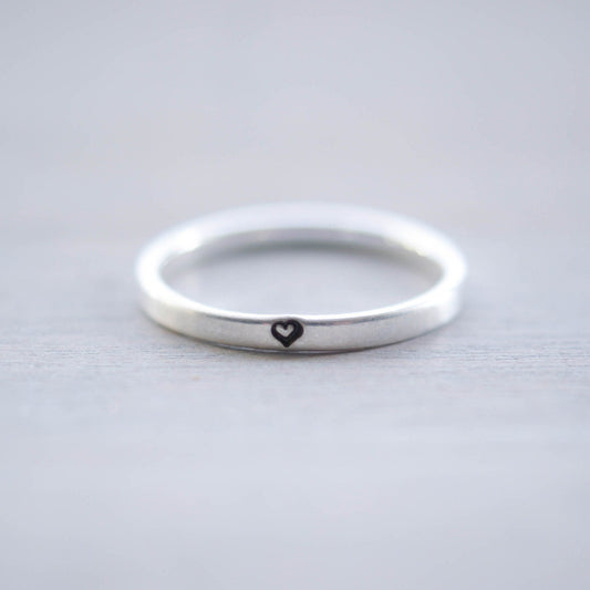 Sterling silver ring stamped with small heart