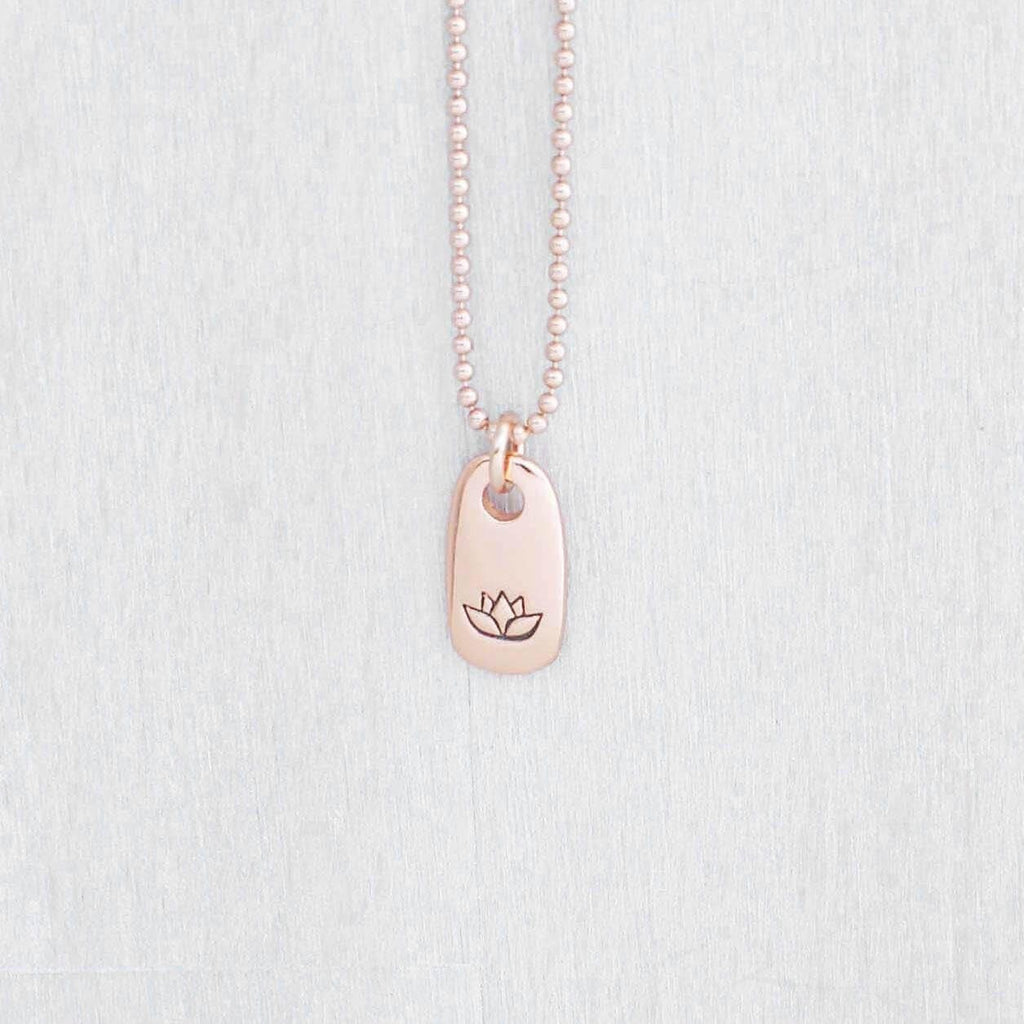 Image of Rose gold small tag necklace stamped with lotus flower