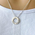 Sterling Silver Necklace stamped with Let Them on white background