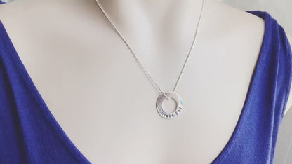 Choose Joy Necklace in sterling silver on neck and being held
