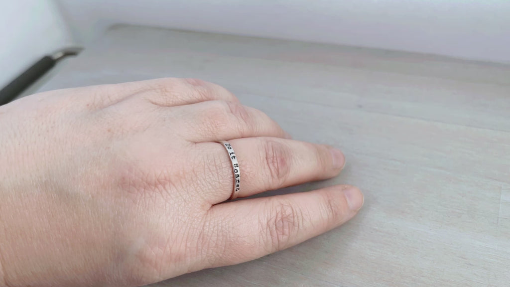 video of a hand wearing and holding a Do it Scared ring in sterling silver