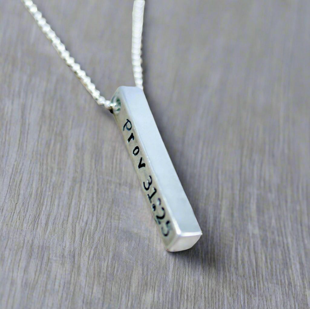 Long silver bar necklace in Artisan Pewter handstamped with Prov 31:25