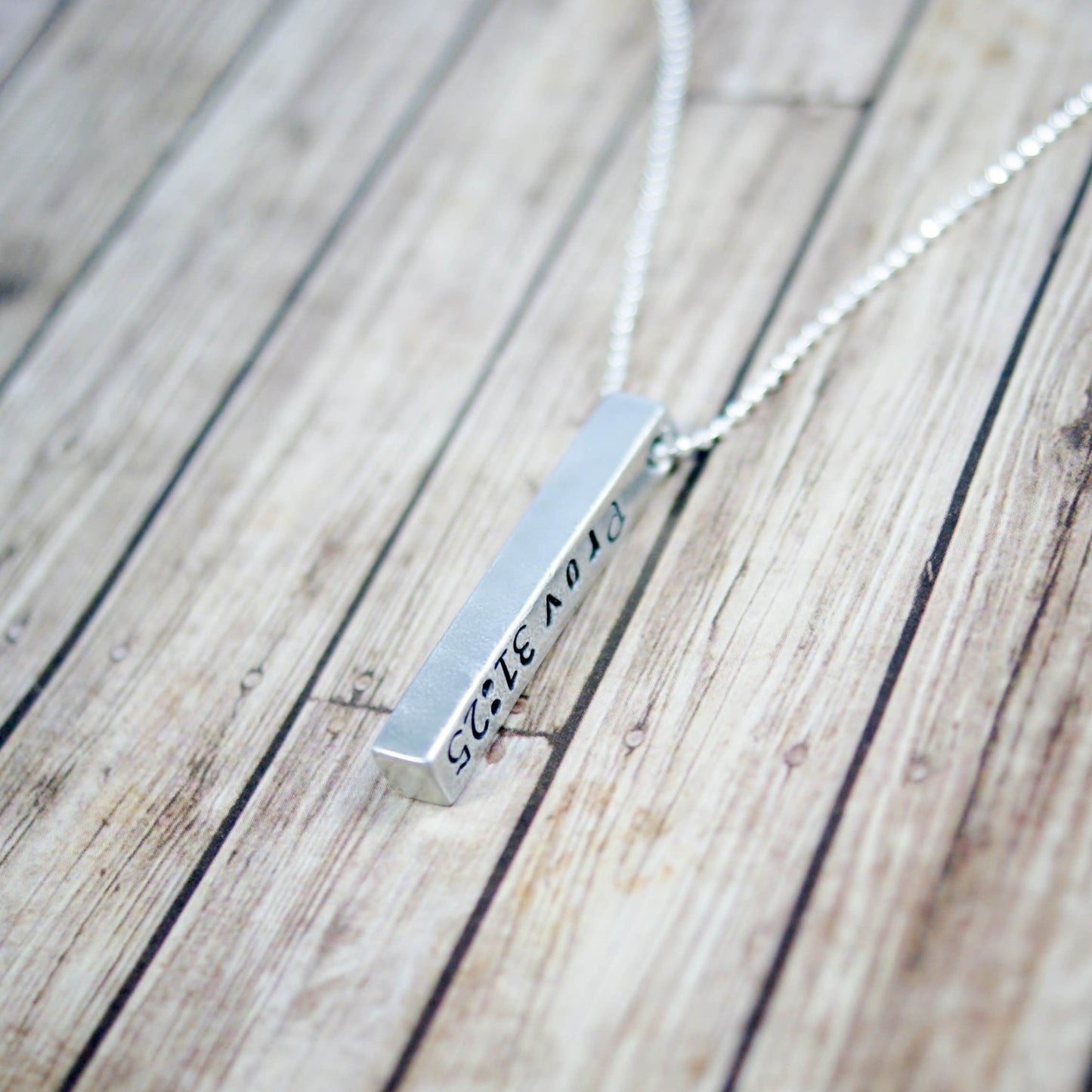 Long silver bar necklace in Artisan Pewter handstamped with Prov 31:25