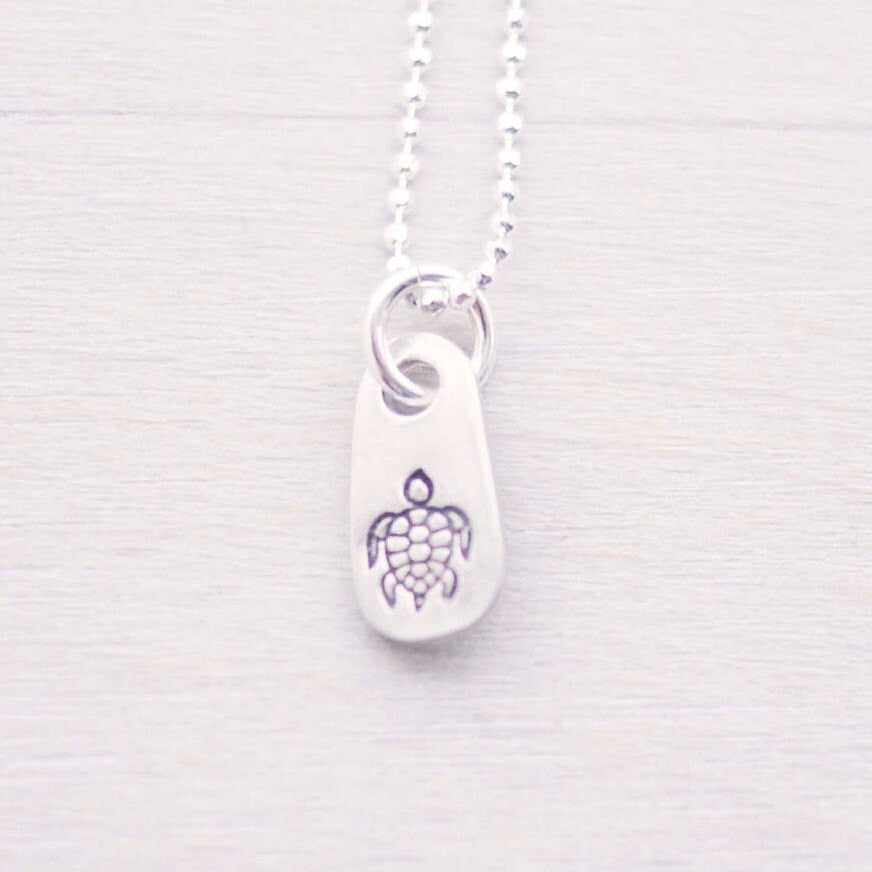 Silver sea turtle necklace in artisan pewter