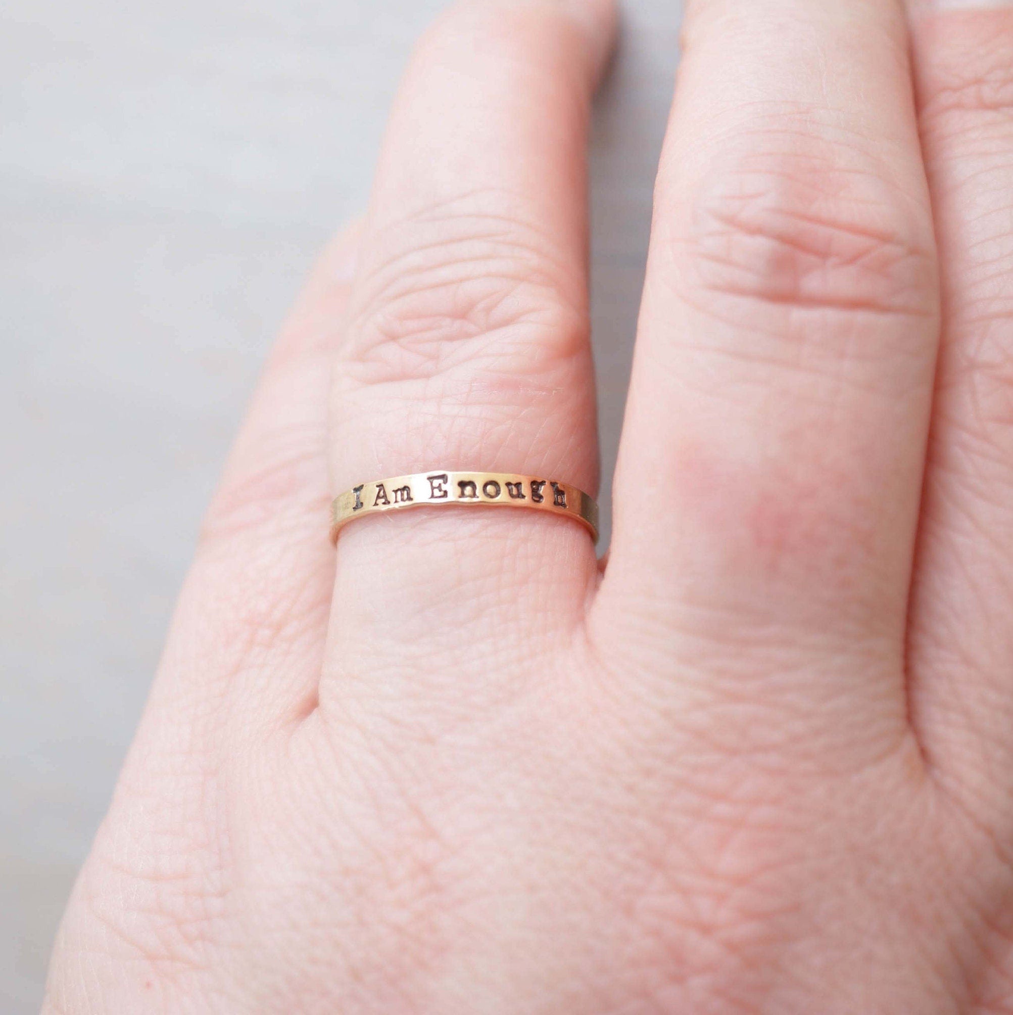 I am Enough ring handstamped in gold-filled on hand