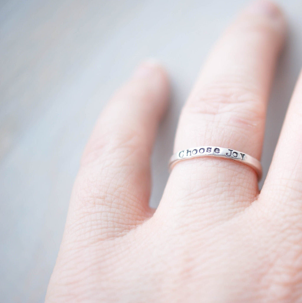 Stacking ring in Sterling silver handstamped with Choose Joy on hand