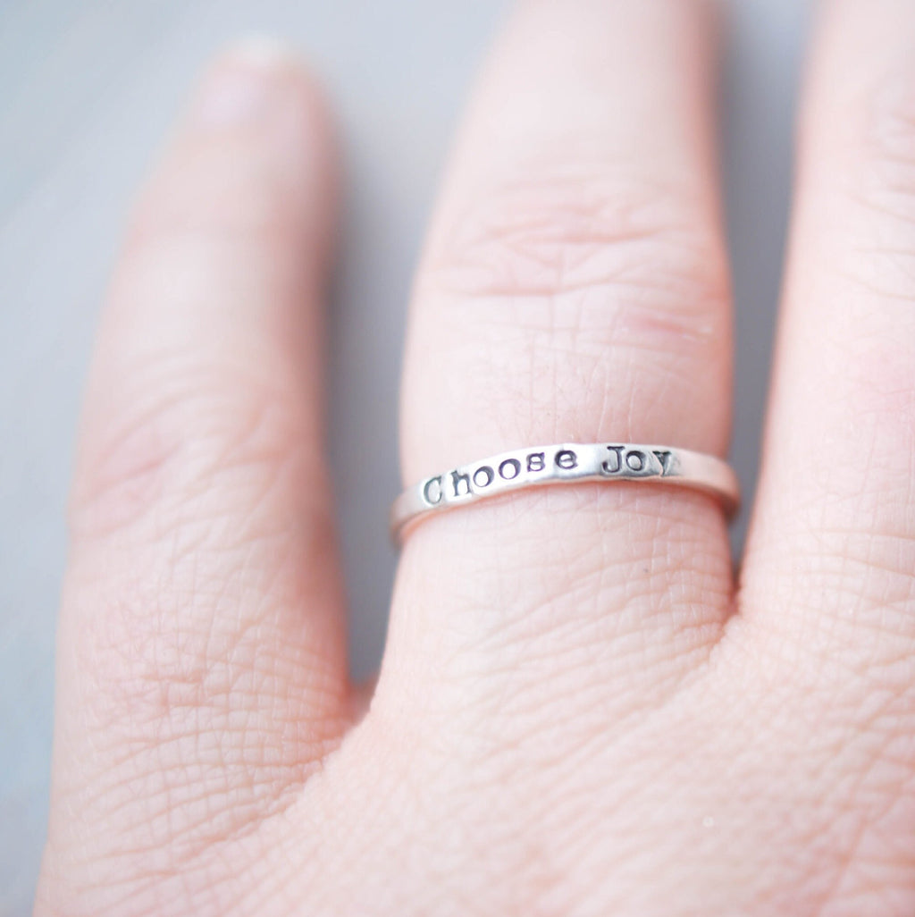 Stacking ring in Sterling silver handstamped with Choose Joy on hand