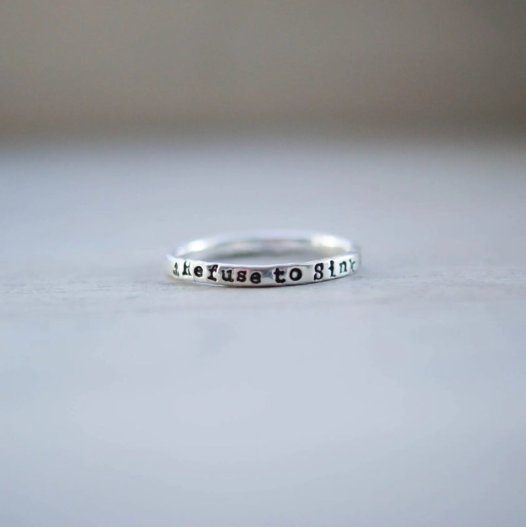 Sterling silver ring handstamped with Refuse to sink