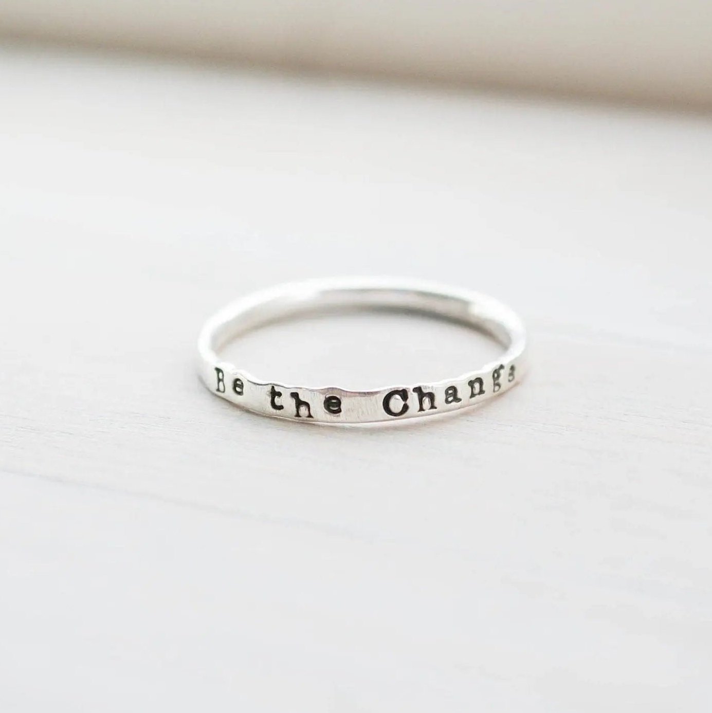 Skinny Stacking Ring handstamped with Be the Change in Sterling Silver