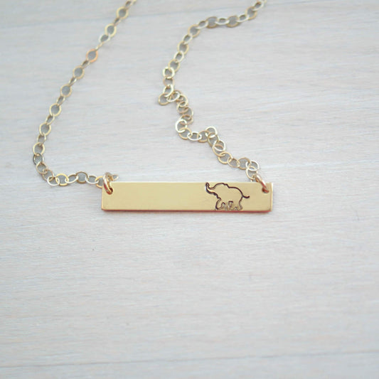 Gold bar neckalce stamped with elephant